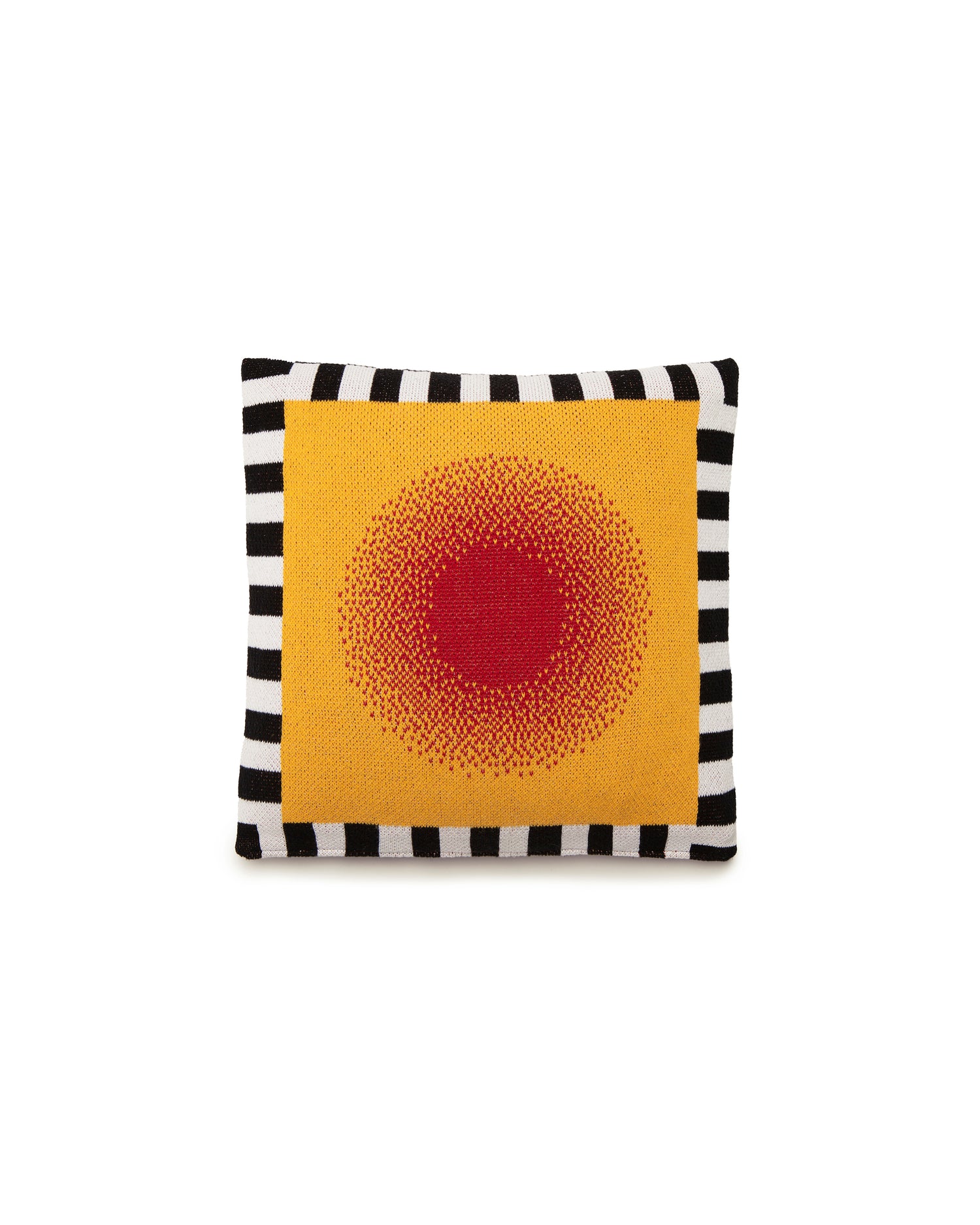 Image of reverse side of knit burst pillow cover showing the side that has a red circle gradually fading into a yellow background with a black and white stripe border along the entirety of the cover. 