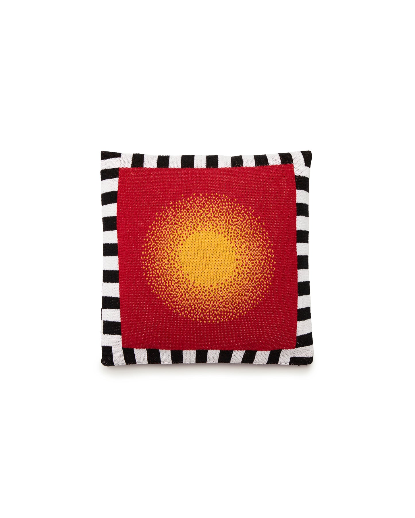 Image of knit burst pillow cover showing the side that has a yellow circle gradually fading into a red background with a black and white stripe border along the entirety of the cover. Size is 18" by 18"