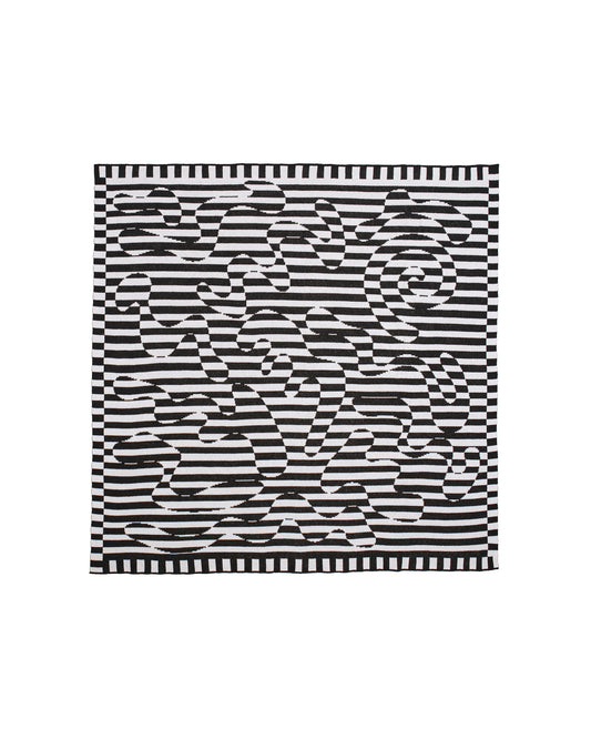 Image of Dazzle Blanket with a black and white striped swirl pattern with a black and white stripe border around the entirety of the design. Knit blanket that is 60" by 60”.